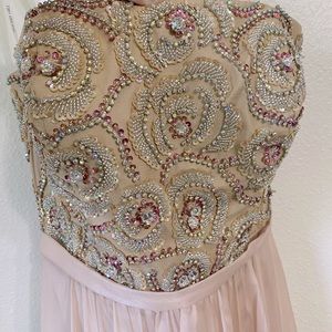 Sheri Hill gown. Strapless beaded with sequins. Long champagne color.